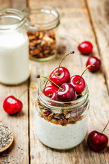 Chia seeds granola Greek yoghurt pudding with cherries