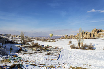 Single ballon rising in cappadocia winter