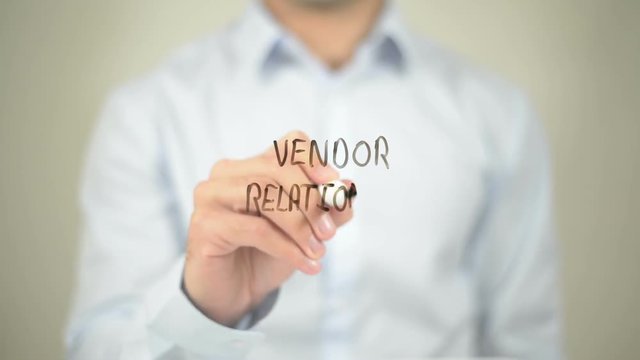Vendor Relaitionship Management, Man Writing on Transparent Screen