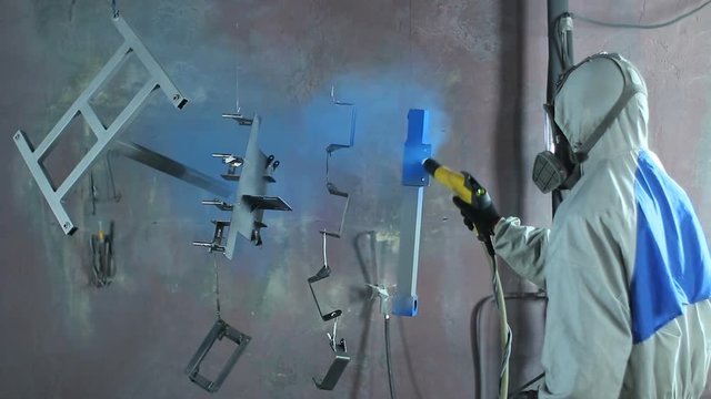 Powder coating of parts at the factory