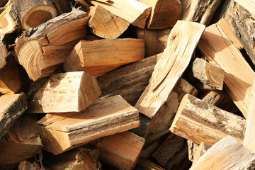 Firewood background - chopped firewood