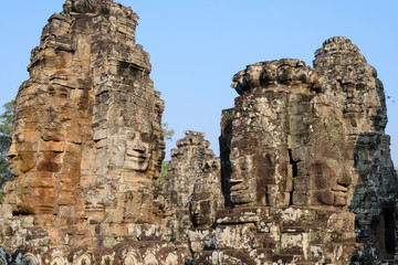 Stone face in Bayon Temple at Angkor Wat complex in Siem Reap Cambodia