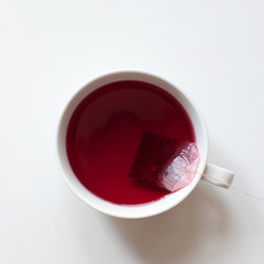 Red fruit tea cup and tea bag - 111725690