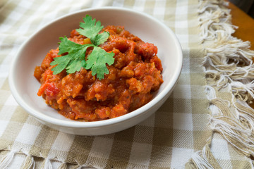 Thai Northern local Style minced Pork and Tomato Relish paste dip. Nam Prik Ong. 
very famous spicy yummy hot chilli pepper paste sauce.
 