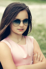 Small girl in sunglasses