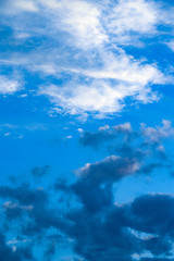 Fototapeta na wymiar Clouds developing into a storm on a blue sky background