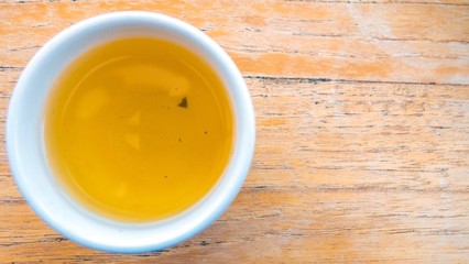 a cup of tea with wood background : copy space