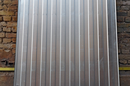 Franment of the corrugated metal sheet