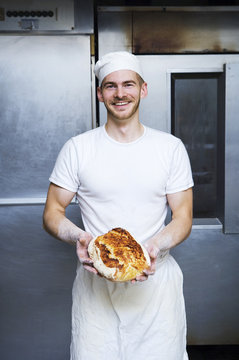 A baker in a bakery, Sweden.