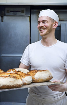 A baker in a bakery, Sweden.