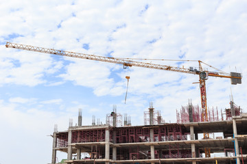 Big construction crane and the building against the sky