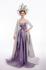 Studio shot of woman with crown