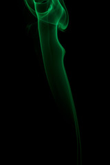 Obraz premium Abstract green smoke from aromatic sticks.