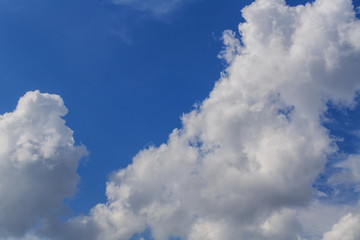 Blue sky with tiny clouds