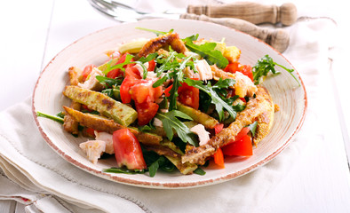 Zucchini, chicken, tomato and rocket salad