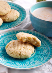 Coconut crunchy cookies on blue plate