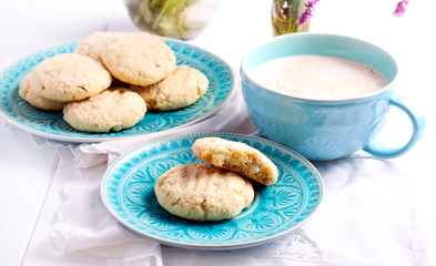 Coconut crunchy cookies on blue plate