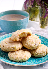 Coconut crunchy cookies on blue plate