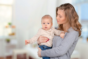 Happy young mother and her son