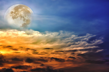 Naklejka na ściany i meble Beautiful sky with clouds, bright full moon would make a great background.