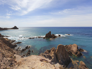 Fototapeta na wymiar Rocky coastline at Cabo de Gata-Nijar Natural Park