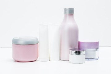Cosmetic containers isolated on white