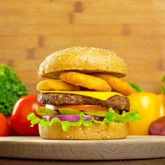 burgers on wooden background