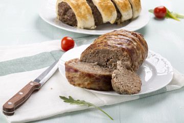 Minced meatloaf wrapped in bacon