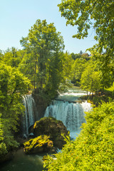      Waterfall on Korana river canyon and beautiful village of Rastoke near Slunj in Croatia 