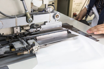Industrial sewing machines with sewing machine operator
