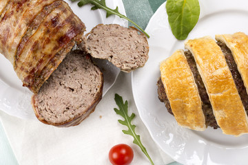 Two different meatloaf of minced meat.