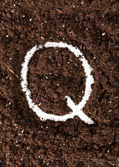 Alphabet written on-ground coffee