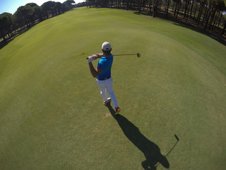 Fototapeta premium top view of golf player hitting shot