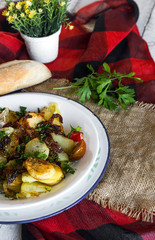 Fried potato with onion and parsley