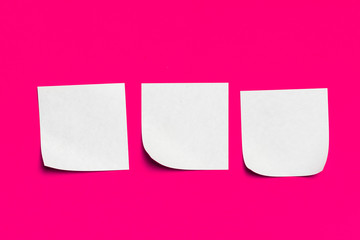Reminder sticky notes on red background