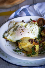 Fried egg yolk and potatoes