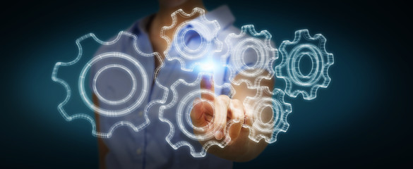 Businessman holding digital 3D engine