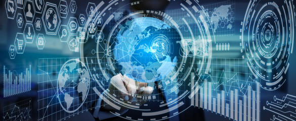 Obraz premium Businessman holding digital charts and globe