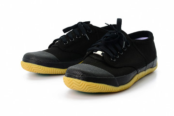 Black sneakers isolated on white background