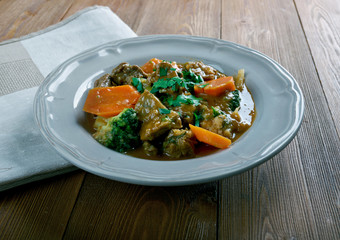  German traditional beef stew with carrots, dark beer