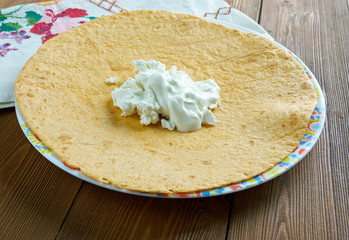 Guirila with crumbled white cheese.