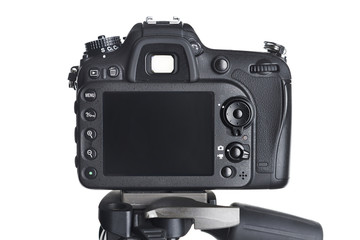 Back view SLR camera on tripod isolated white