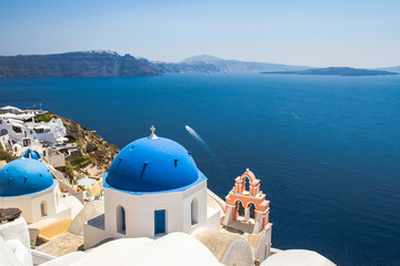 Fototapeta na wymiar Church domes in Oia Santorini