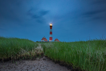 Fototapeta na wymiar Westerhever Sand Leuchtturm
