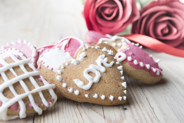 Festive cookies with hearts and roses for Valentine's Day.