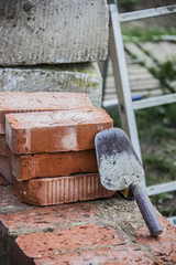 bricks trowel and tools still life on the theme of construction