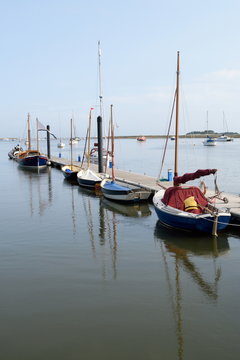 Sailing boats in Wells-next-the-sea harbor, Norfolk, England