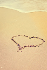 Love Heart drawn on sandy atlantic coast