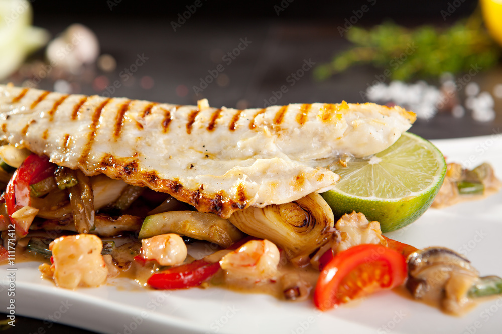 Sticker fillet of seabass with vegetables