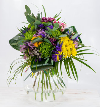 Colorful flower bouquet arrangement centerpiece in vase